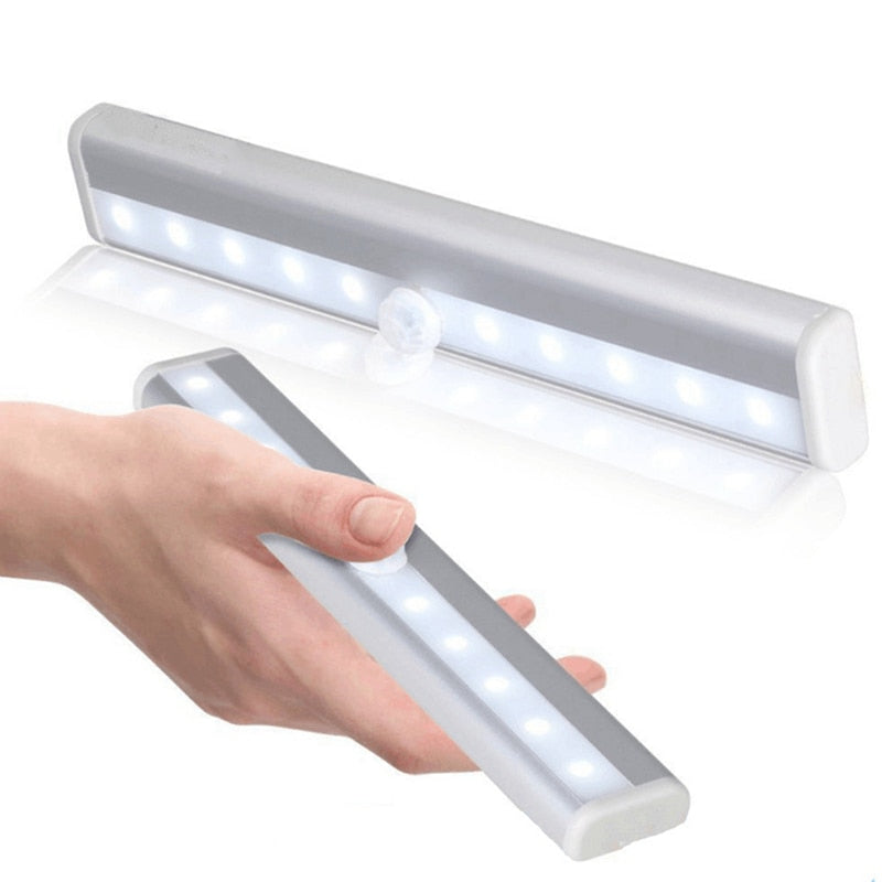 Motion sensor LED night light stick-on battery powered closet bedroom light feature closeup