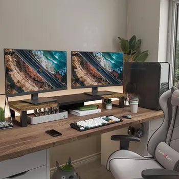 Dual monitor stand used on an organized desk
