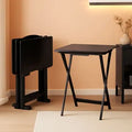Four-pack of black foldable TV tray tables