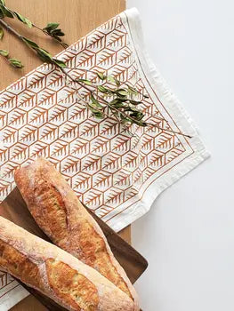 Natural tea towel with two-color artisan tree design