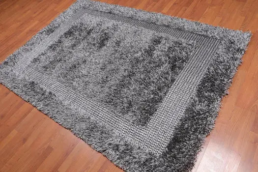 Silver-gray shag rug pile texture