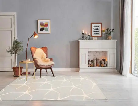 Five-by-eight gray and ivory hand-tufted wool rug