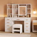 White vanity desk with integrated illuminated mirror