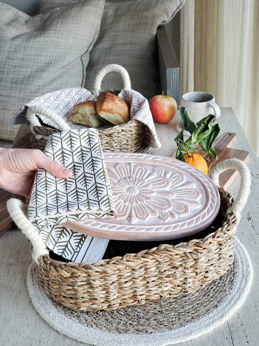 Bread warmer basket styled with bread for serving