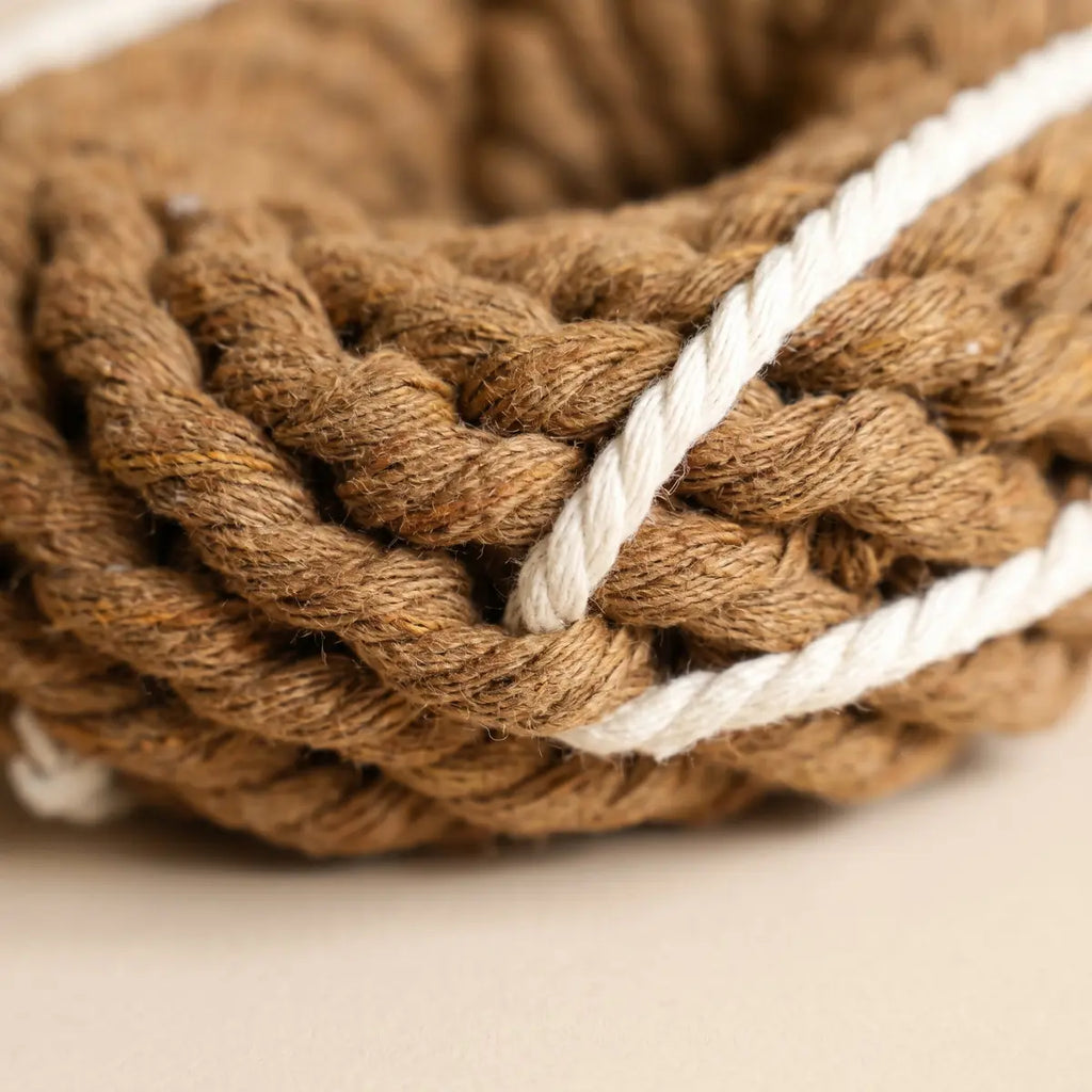Close-up of tightly woven rope texture on dog toy
