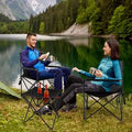 Black folding camping chairs and table set
